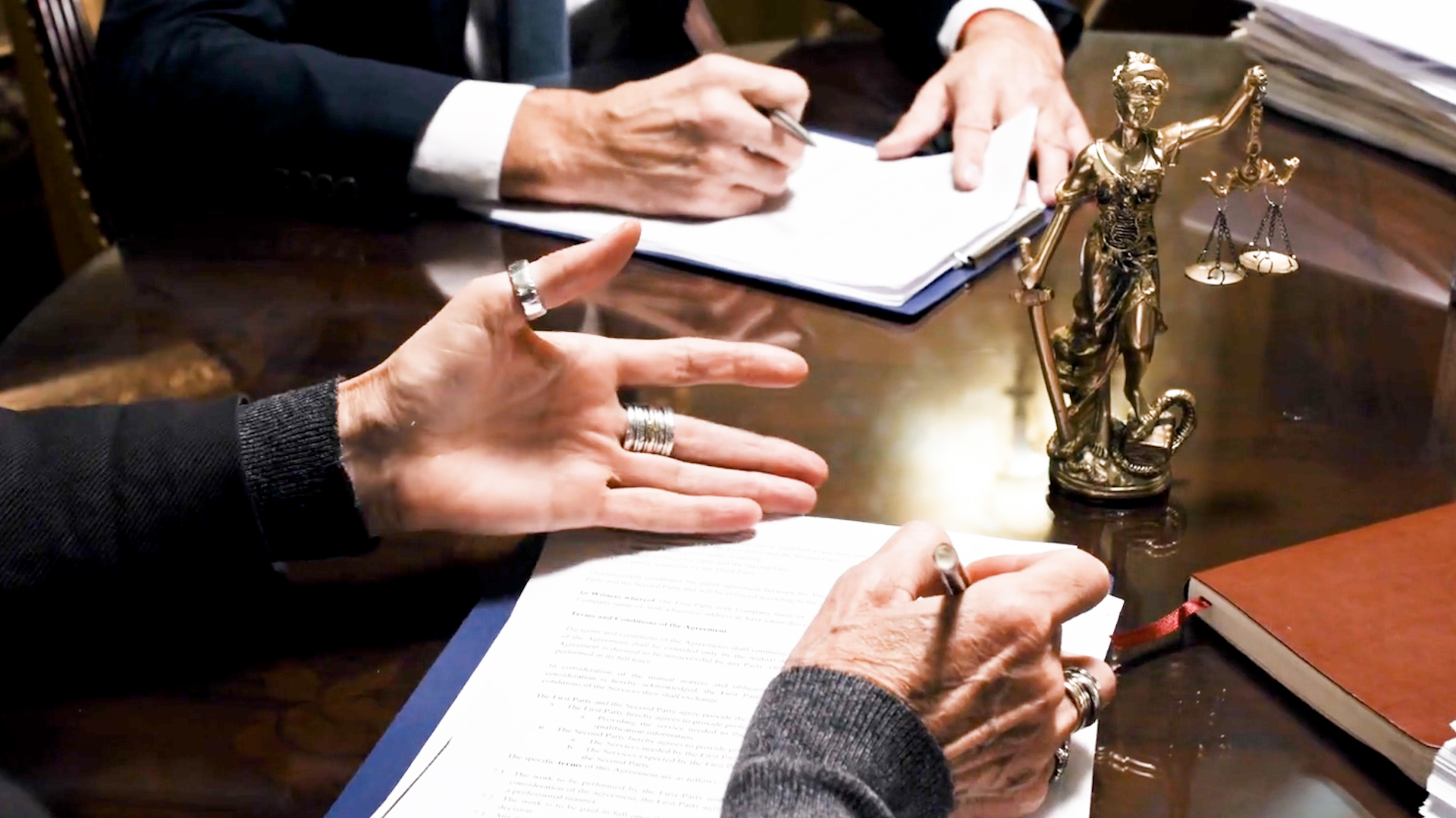 Legal professionals looking over documents