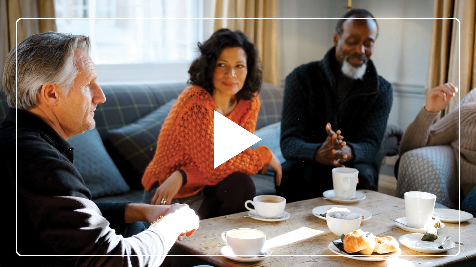 people talking while having coffee