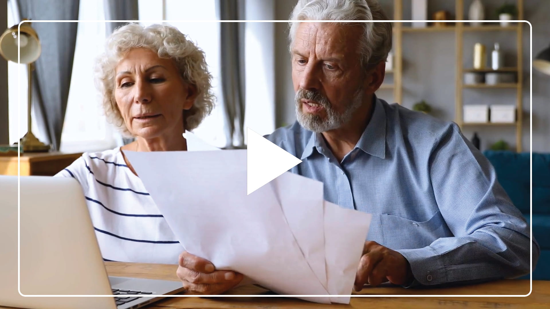 older couple looking at papers